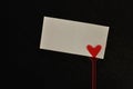 A note holder with a red heart with an empty card Royalty Free Stock Photo