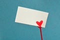 A note holder with a red heart with an empty card Royalty Free Stock Photo