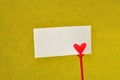 A note holder with a red heart with an empty card Royalty Free Stock Photo