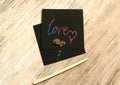 Note I love you for Valentines Day in retro toning. Art scratch paper for message