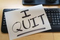 Note on a keyboard with the text I QUIT. Great resignation concept