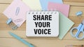 note with the message of share your voice, Royalty Free Stock Photo