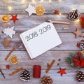 2018 and 2019 on note pad in christmas flat lay Royalty Free Stock Photo