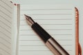 Note pad and fountain pen. Royalty Free Stock Photo