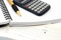 Note pad with pen, calculator, cheque book Royalty Free Stock Photo