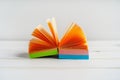 Note pad of sticky notes open like an fan, office stationery. Copy space Royalty Free Stock Photo