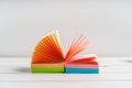 Note pad of sticky notes open like an fan, office stationery. Copy space Royalty Free Stock Photo