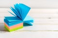 Note pad of sticky notes open like an fan, office stationery. Copy space Royalty Free Stock Photo