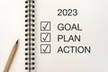 Note Pad with text 2023 Goal, Plan and Action