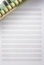 Note paper for musical notes with old accordion. Royalty Free Stock Photo