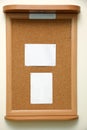 Note paper pined on cork board background Royalty Free Stock Photo
