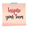 Note paper with text inspire your team. Motivation message, business concept.