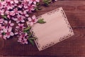 Note, postcard, writing retro peach blossoms on a wooden vintage Royalty Free Stock Photo