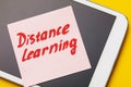 Note with text on the tablet. Concept on the topic of distance learning in quarantine