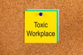 Note with words Toxic Workplace on a corkboard Royalty Free Stock Photo