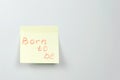 Note on yellow sticker paper sheets with motivation words born to be.