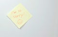 Note on yellow sticker paper sheets with words i`m so sorry. Family note.