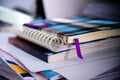 Notebook background on stack of books Royalty Free Stock Photo