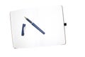 Notebook and ballpoint pen. Royalty Free Stock Photo