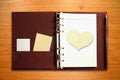 Notebook with blank heart shape paper