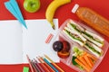 Healthy lunch boxes sandwich vegetables juice top view notebook Royalty Free Stock Photo