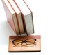 Notebook,books and glasses on white background Royalty Free Stock Photo