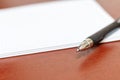 The notebook in the box with pen closeup Royalty Free Stock Photo