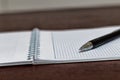The notebook in the box with pen closeup, toned Royalty Free Stock Photo