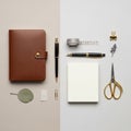 Notebook with a button closure is accompanied by a black and Royalty Free Stock Photo