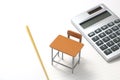 Notebook, calculator, pencil and miniature desk Royalty Free Stock Photo