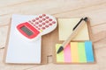 Notebook, Calculator, On Wood Background, Selective Focus. Royalty Free Stock Photo