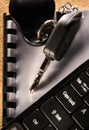 Car key and computer keyboard Royalty Free Stock Photo