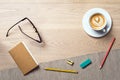 Notebook and coffee as flat lay and template from above Royalty Free Stock Photo