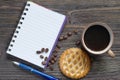 Notebook, coffee and cakes with apple filling Royalty Free Stock Photo