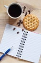 Notebook, coffee and cakes with apple filling Royalty Free Stock Photo