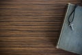 Notebook with coffee on wooden tabel