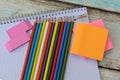 notebook and colored pencils paper education eraser table study Royalty Free Stock Photo