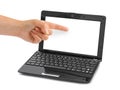Notebook computer and pointing hand Royalty Free Stock Photo