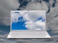 Notebook computer and sky Royalty Free Stock Photo