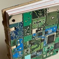 Features a mosaic of various PCBs in green, blue, and black, with visible Royalty Free Stock Photo