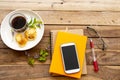 Notebook diary ,mobile phone for business work with dessert ,hot coffee espresso of lifestyle