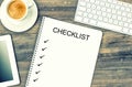 Notebook, digital tablet, keyboard and coffee. Mock up Checklist