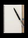 Notebook and fountain pen isolated on black Royalty Free Stock Photo