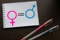 Notebook with gender equality women and men symbols