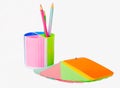 Notebook and glass of crayons Royalty Free Stock Photo