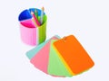 Notebook and glass of crayons. Royalty Free Stock Photo