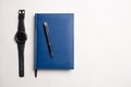 Notebook with glasses and pen, Book with glasses, Blue notebook Royalty Free Stock Photo