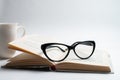 Notebook with glasses and pen, Book with glasses, Blue notebook Royalty Free Stock Photo