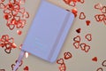 notebook between hearts Royalty Free Stock Photo