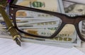 Notebook with dollars, pen and glasses financial business accounting Royalty Free Stock Photo